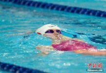 傅園慧游出59秒84的成績，奪得全國游泳冠軍賽女子100仰金牌。(資料圖)中新社記者 韓海丹 攝